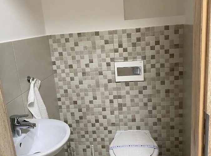 Paskom Apartmanhaz Апартаменты